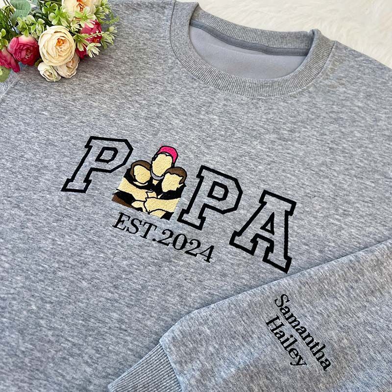 A Papa T-shirt with a photo and a sweatshirt separately embroidered with the portraits of the father and the child