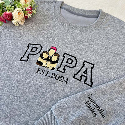 A Papa T-shirt with a photo and a sweatshirt separately embroidered with the portraits of the father and the child